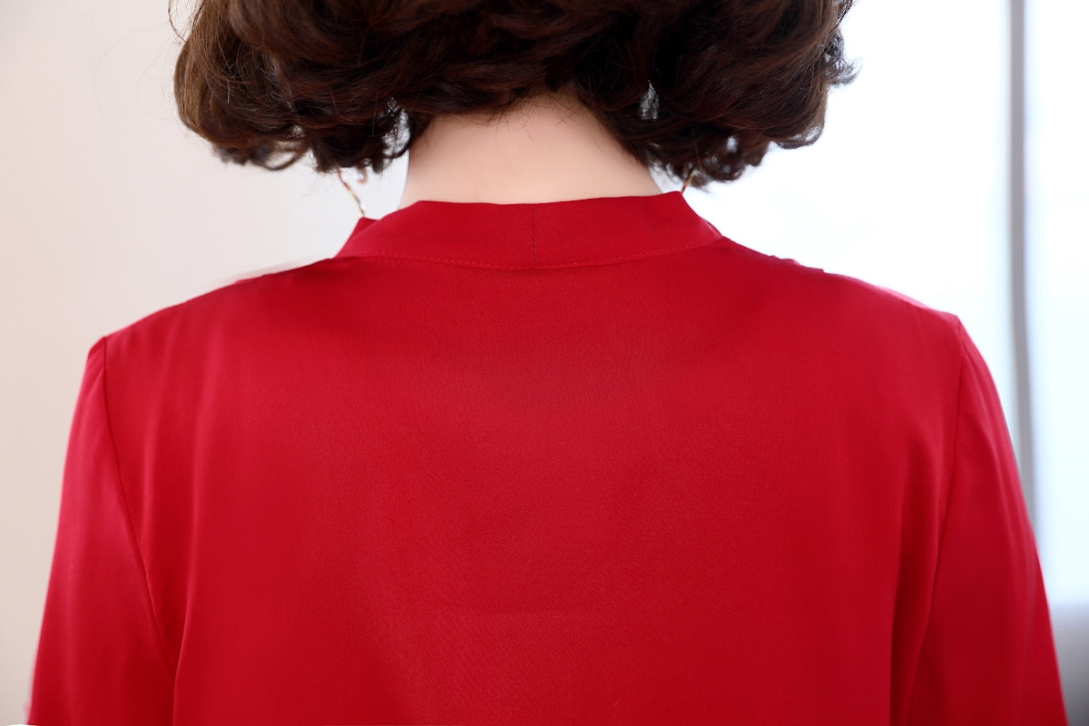 Back view of a woman in a red top