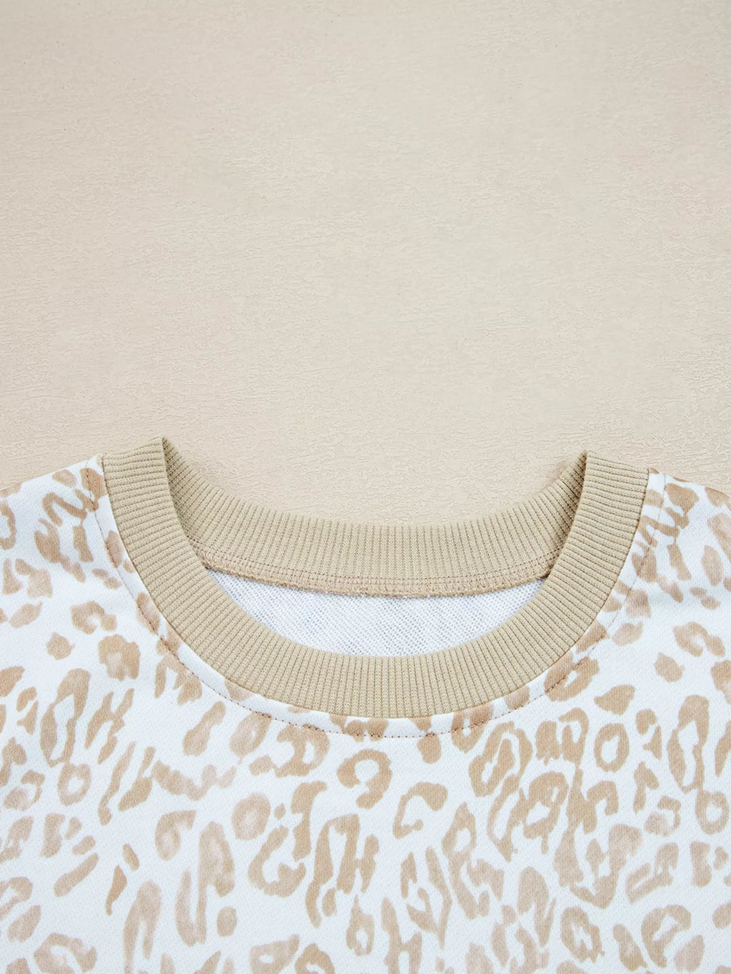 Sarah Express Women's Leopard Ruffle Detail Ribbed Trim Round Neck Sweatshirt