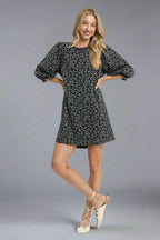 Sarah Express women’s leopard print jacquard mini dress for a night out.
