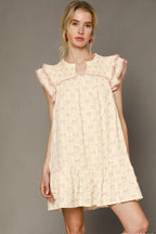 Sarah Express women’s bow print mini dress with a classic collar and feminine ruffled cap sleeves.
