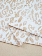 Sarah Express Women's Leopard Ruffle Detail Ribbed Trim Round Neck Sweatshirt