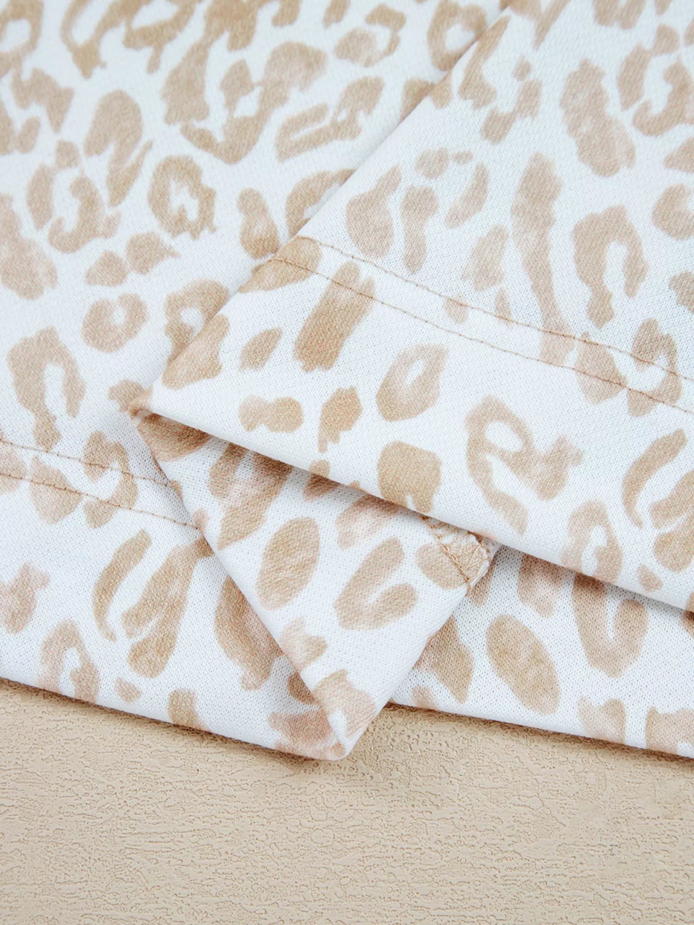 Sarah Express Women's Leopard Ruffle Detail Ribbed Trim Round Neck Sweatshirt