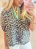 Sarah Express Women's Leopard Print Notched Blouse with Striped Trim