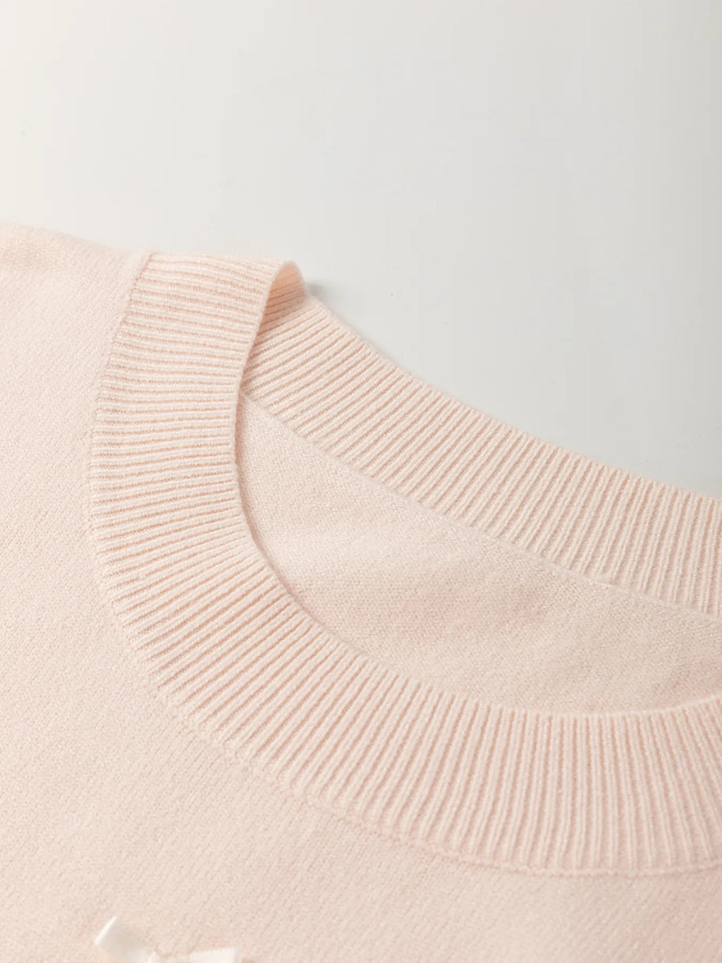 Sarah Express Women's Pearl Embellished Bow Detail Short Sleeve Sweater