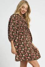 Sarah Express women’s floral tie-neck babydoll dress with ruched details.