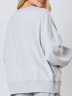 Sarah Express Women's Pearl Embellished Bow Long Sleeve Sweatshirt