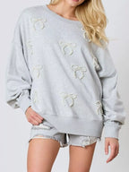 Sarah Express Women's Pearl Embellished Bow Long Sleeve Sweatshirt