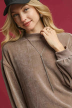 Sarah Express women’s velour crewneck sweatshirt with voluminous balloon sleeves.
