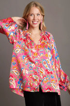 Sarah Express women’s plus size satin shirt in a vibrant paisley print with an elegant ruffle neck.
