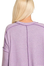 Sarah Express Women’s Plus Size Melange Hacci Tee with Exposed Seam Hi-Low Hem
