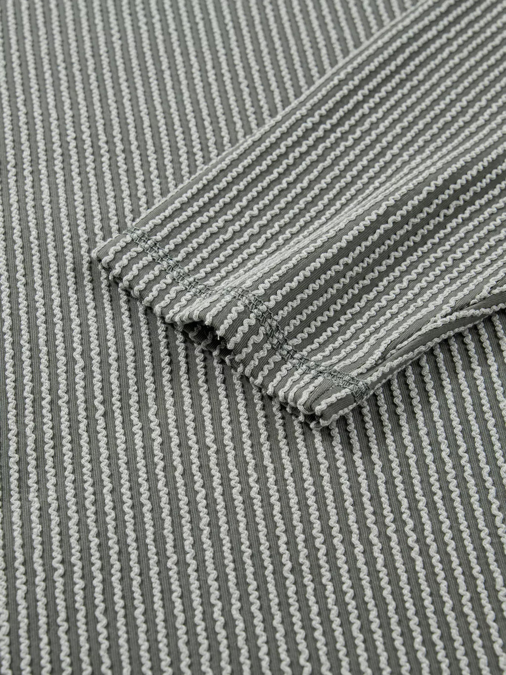 Sarah Express Women's Twist Ribbed Exposed Seam Detail Long Sleeve Loose Top