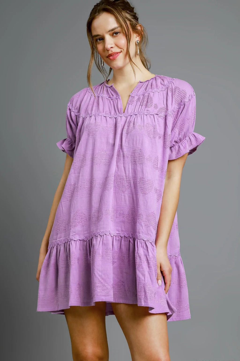 Sarah Express women’s heart pattern babydoll dress with a tiered skirt and short ruffle sleeves.
