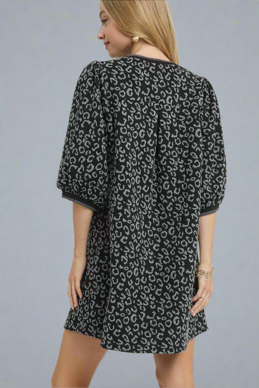 Sarah Express women’s leopard print jacquard mini dress for a night out.
