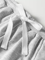 Sarah Express Women's Lace Patchwork Drop Shoulder Top and Drawstring Skort 2pcs Outfit