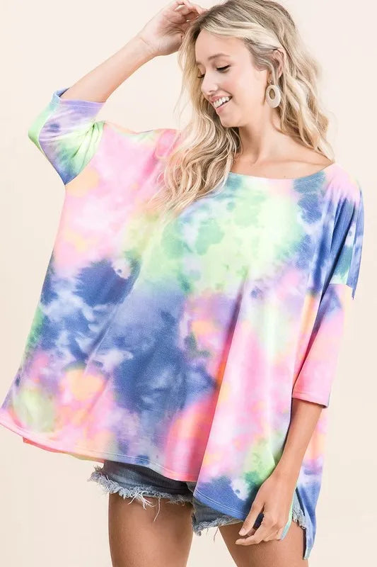 Sarah Express women’s oversized low gauge knit top with a colorful tie-dye print.