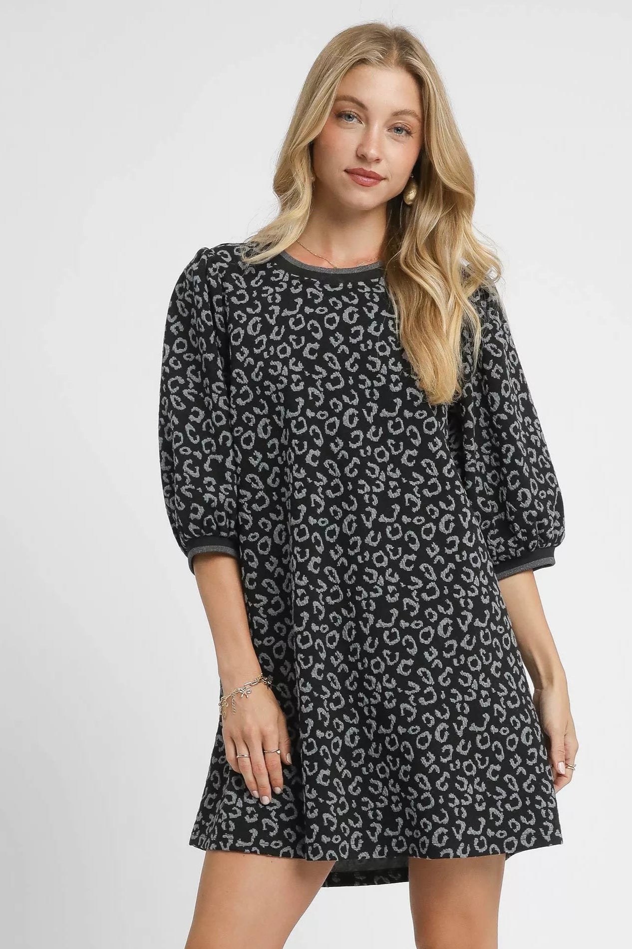 Sarah Express women’s leopard print jacquard mini dress for a night out.