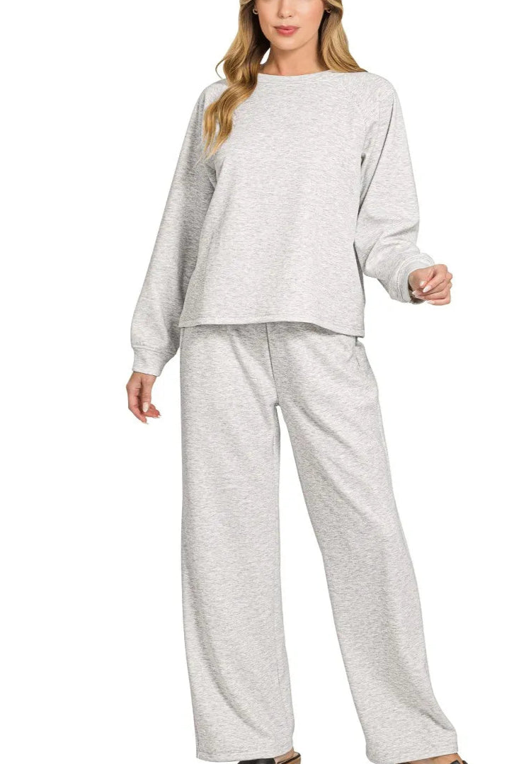 Sarah Express women’s oversized scuba lounge set featuring a crewneck sweatshirt and matching pocketed pants.