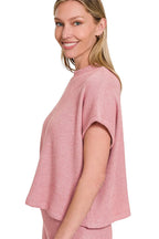 Sarah Express women’s ribbed sweater lounge set featuring a loose, boxy fit top and matching long pants.
