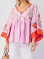 Sarah Express Women's Printed V-Neck Top with Contrast Trim Details