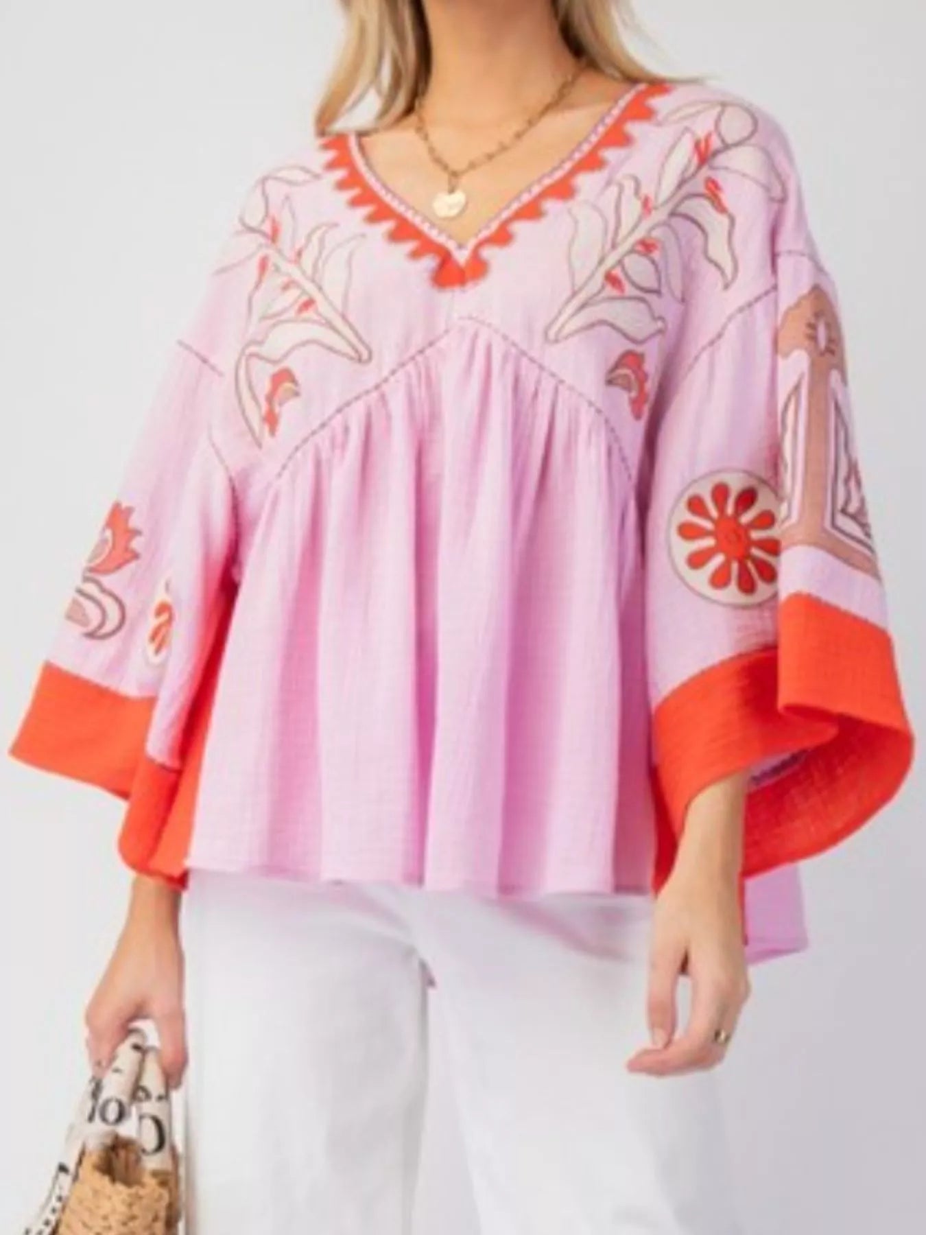 Sarah Express Women's Printed V-Neck Top with Contrast Trim Details