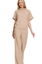 Sarah Express women’s beige ribbed sweater set featuring a turtleneck top and matching wide-leg pants.