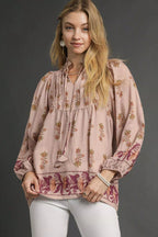 Sarah Express women’s floral boho peasant blouse with long balloon sleeves and a split tie neckline.