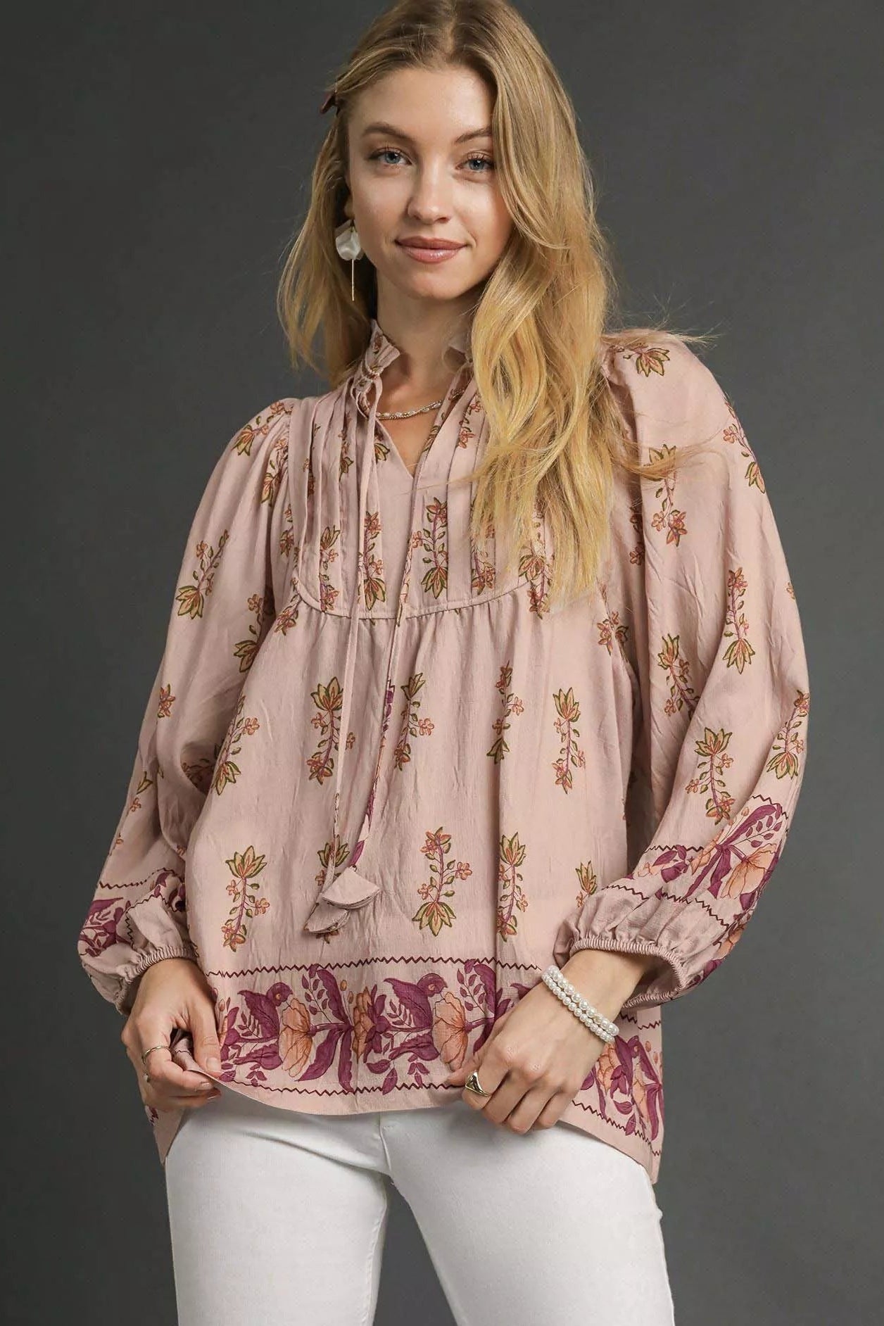 Sarah Express women’s floral boho peasant blouse with long balloon sleeves and a split tie neckline.