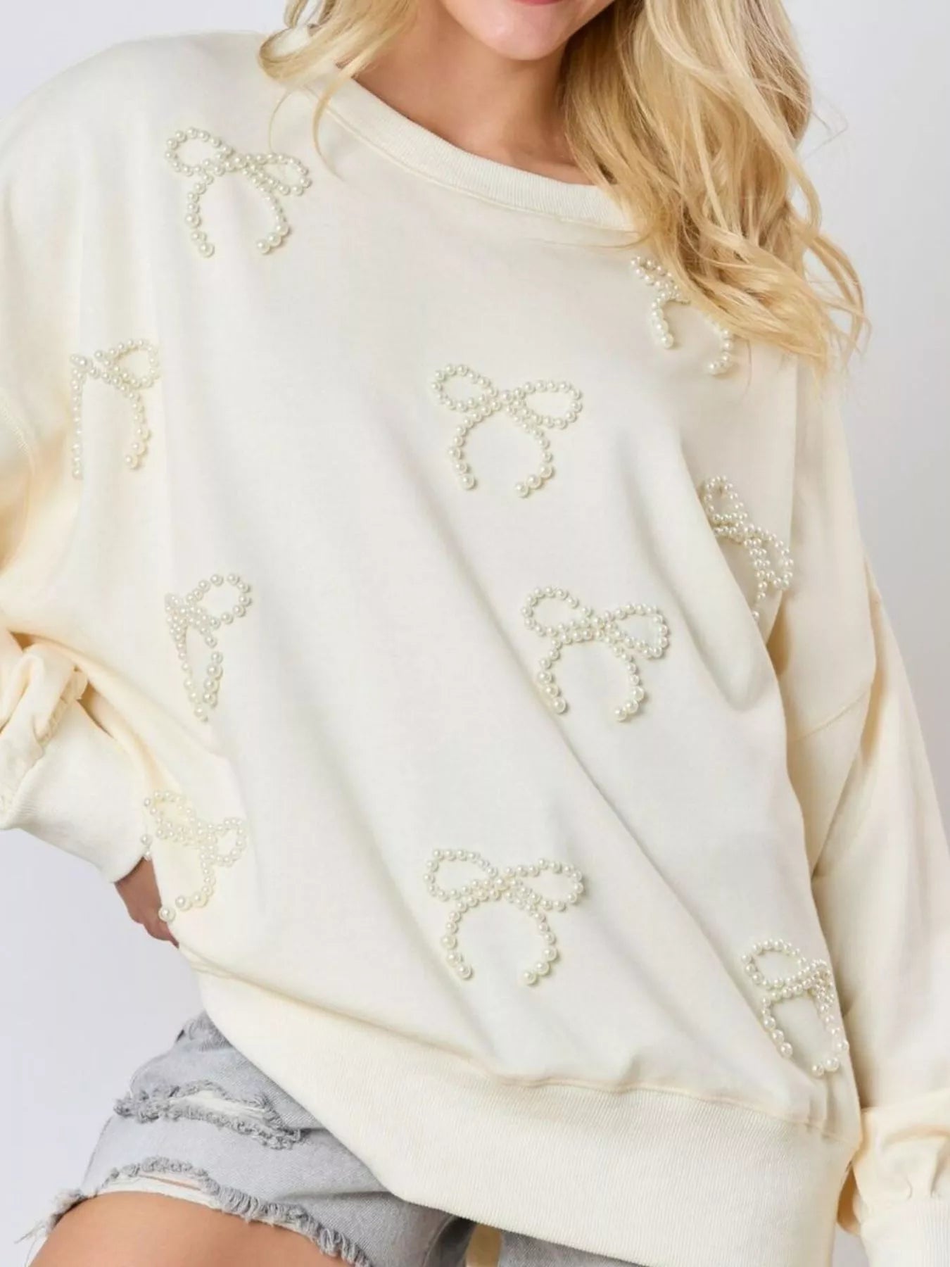 Sarah Express Women's Pearl Embellished Bow Long Sleeve Sweatshirt Ivory