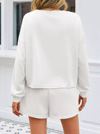 Sarah Express Women's Pearl Embellished Round Neck Top and Skort Set