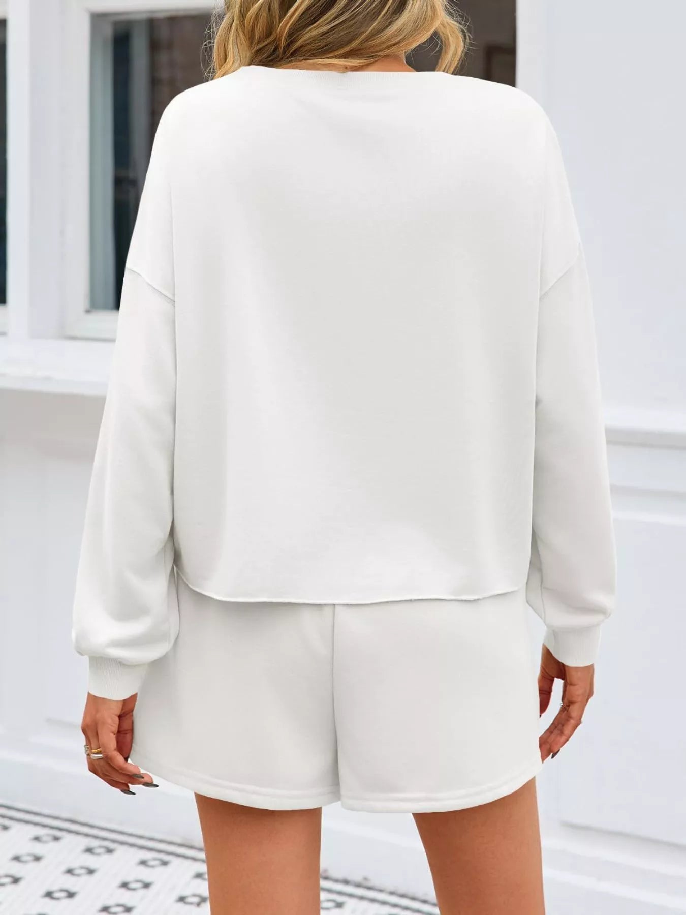 Sarah Express Women's Pearl Embellished Round Neck Top and Skort Set