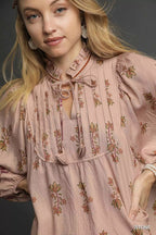 Sarah Express women’s floral boho peasant blouse with long balloon sleeves and a split tie neckline.