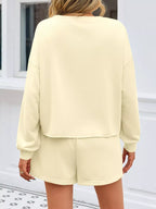 Sarah Express Women's Pearl Embellished Round Neck Top and Skort Set