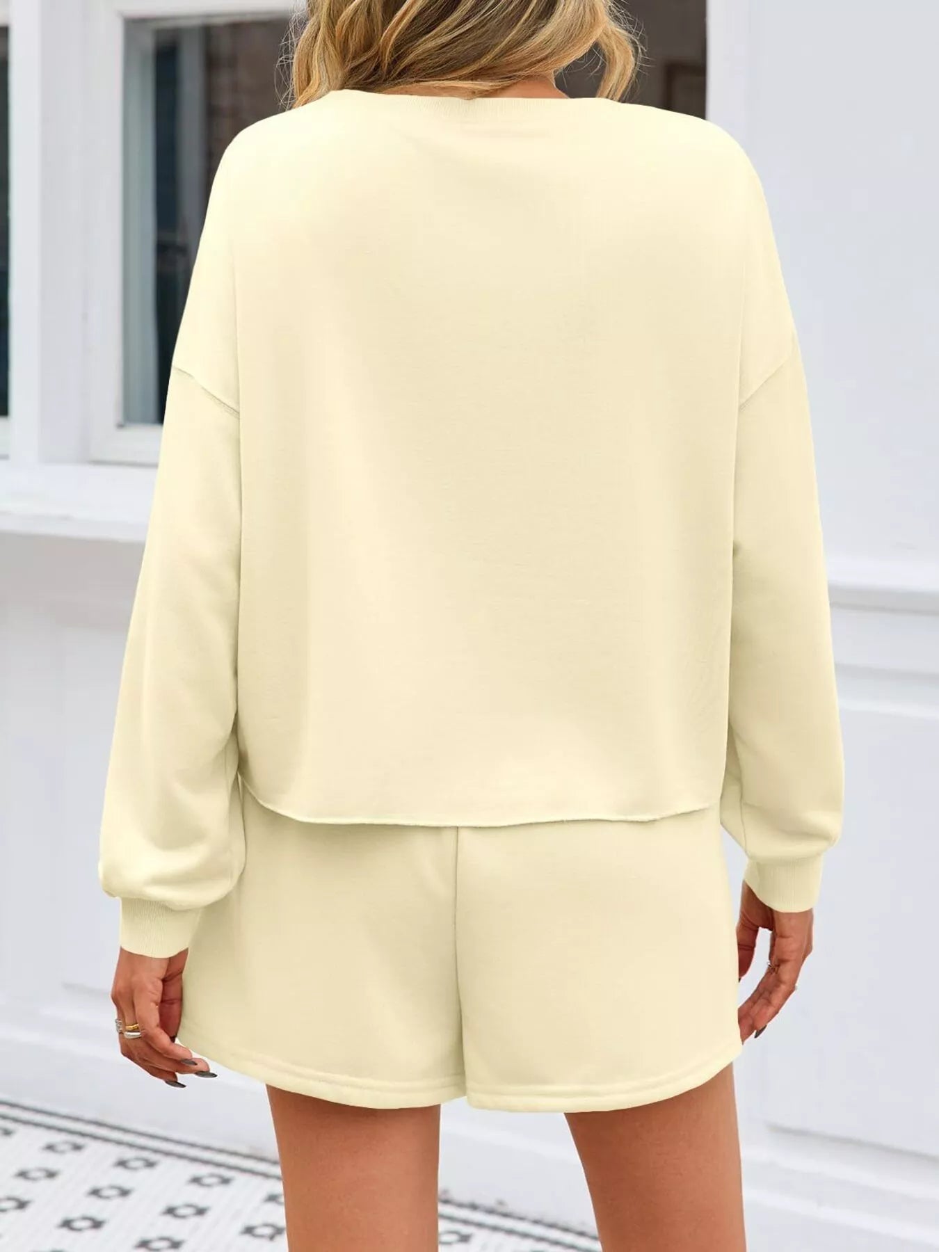 Sarah Express Women's Pearl Embellished Round Neck Top and Skort Set