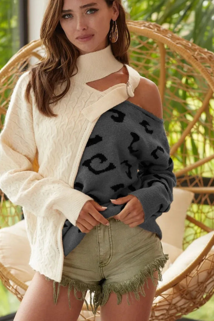 Sarah Express women’s one-shoulder asymmetrical sweater featuring a cable-knit texture and color block design.
