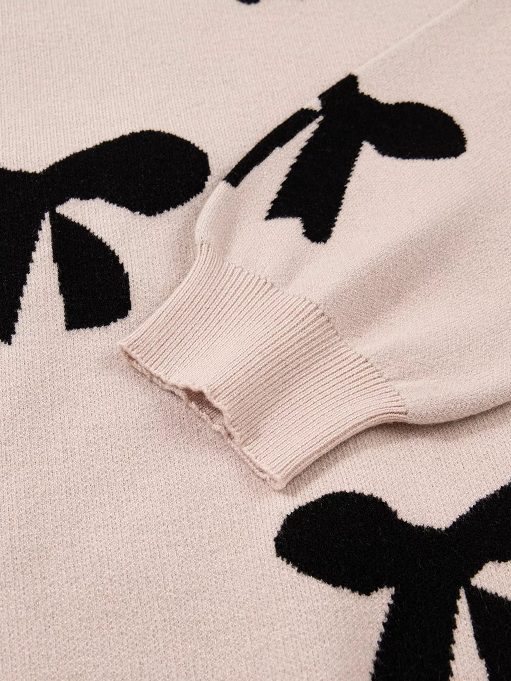 Sarah Express Women's Pearl Embellished Bow Pattern Loose Sweater