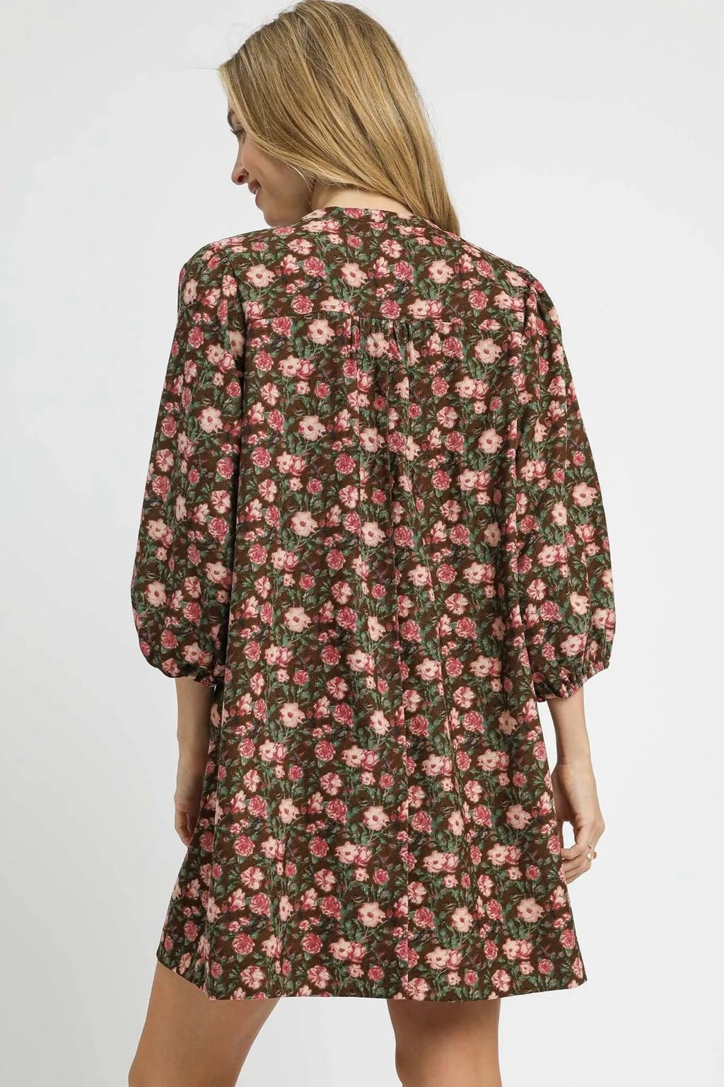 Sarah Express women’s floral tie-neck babydoll dress with ruched details.