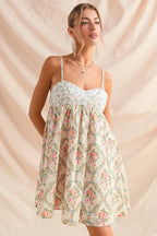 Sarah Express women’s floral print cami dress with a sweetheart neckline, lace trim, and smocked back.

