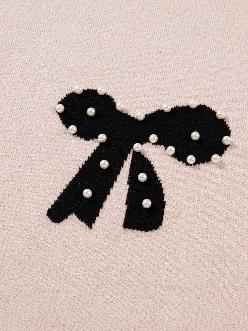 Sarah Express Women's Pearl Embellished Bow Pattern Loose Sweater