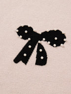 Sarah Express Women's Pearl Embellished Bow Pattern Loose Sweater