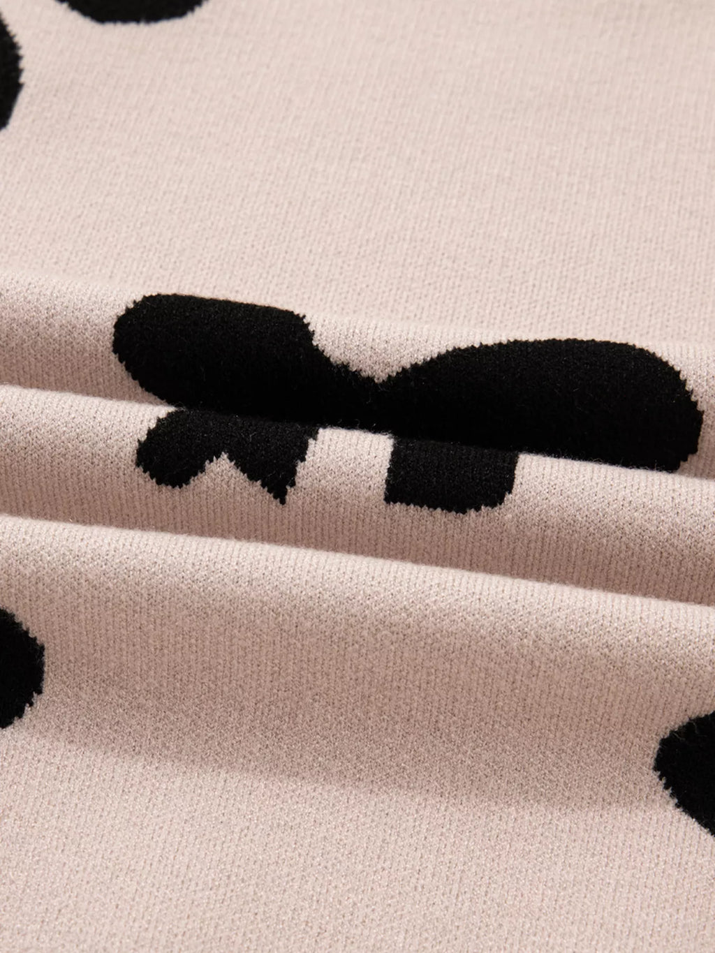 Sarah Express Women's Pearl Embellished Bow Pattern Loose Sweater